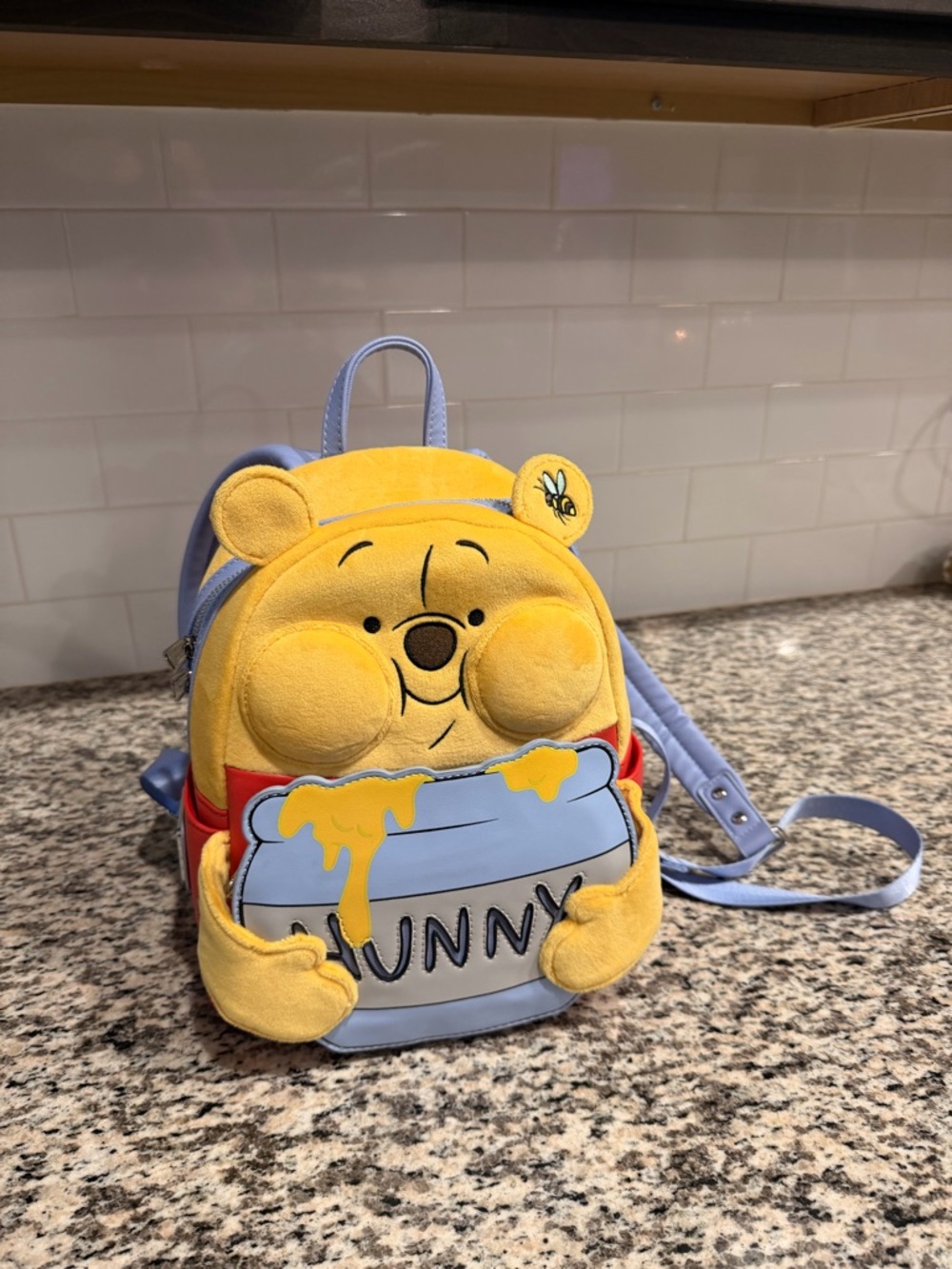 Loungefly Yellow & Light Blue Puffy cheek Winnie the Pooh Mini Backpack